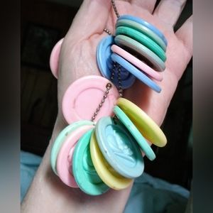 Vintage String of Baby Plastic Animal Discs Rattle      2/24